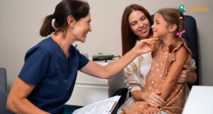 pediatrician checking a child